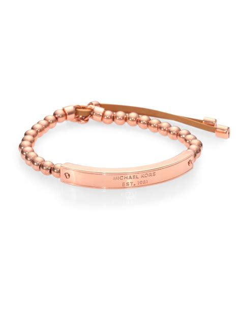 michael kors rose gold heritage plaque bangle